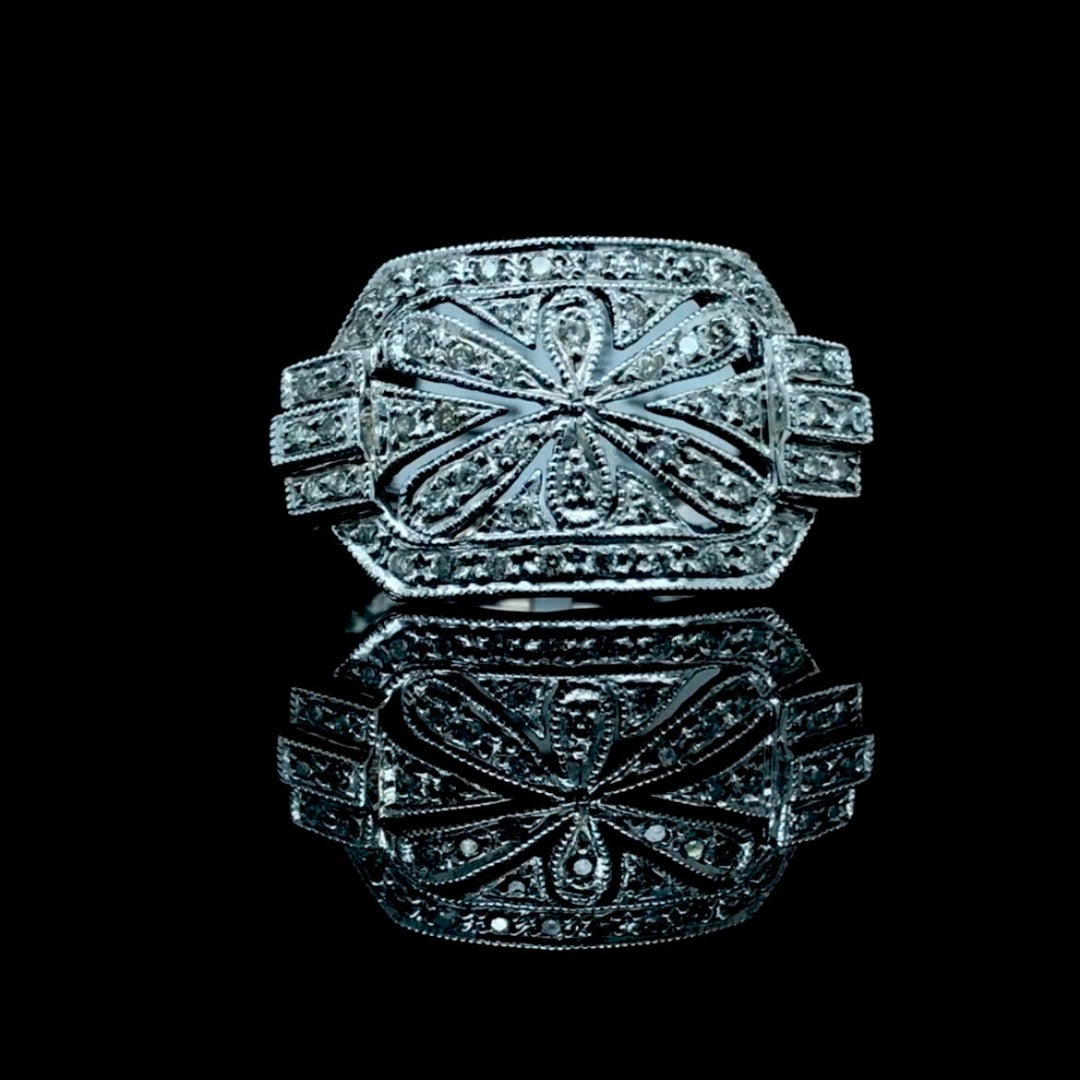 143758 - .28 ctw diamond filigree ring