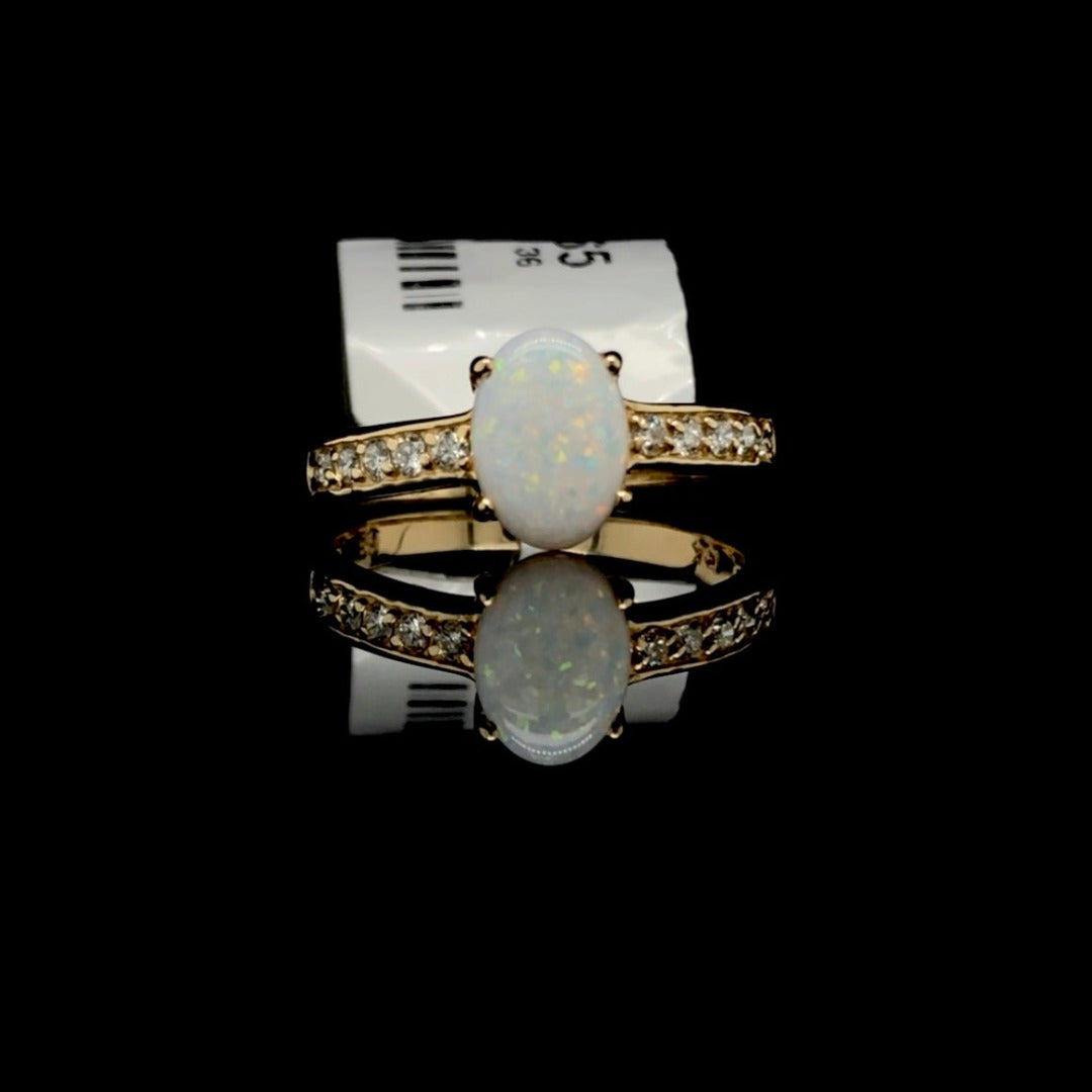 160365 - .79 ctw opal and diamond ring
