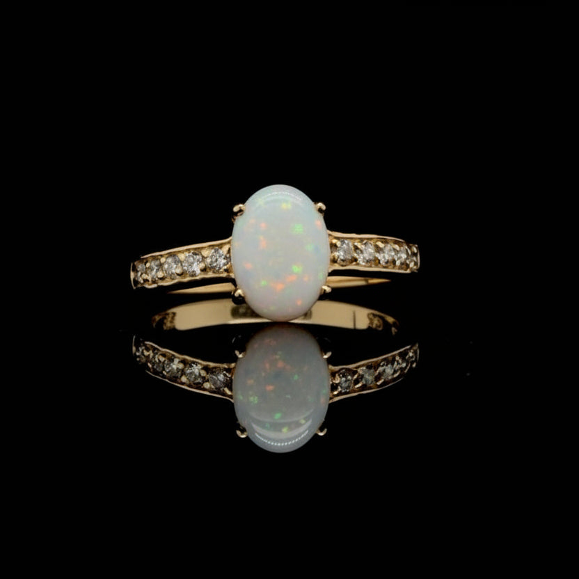 160365 - .79 ctw opal and diamond ring