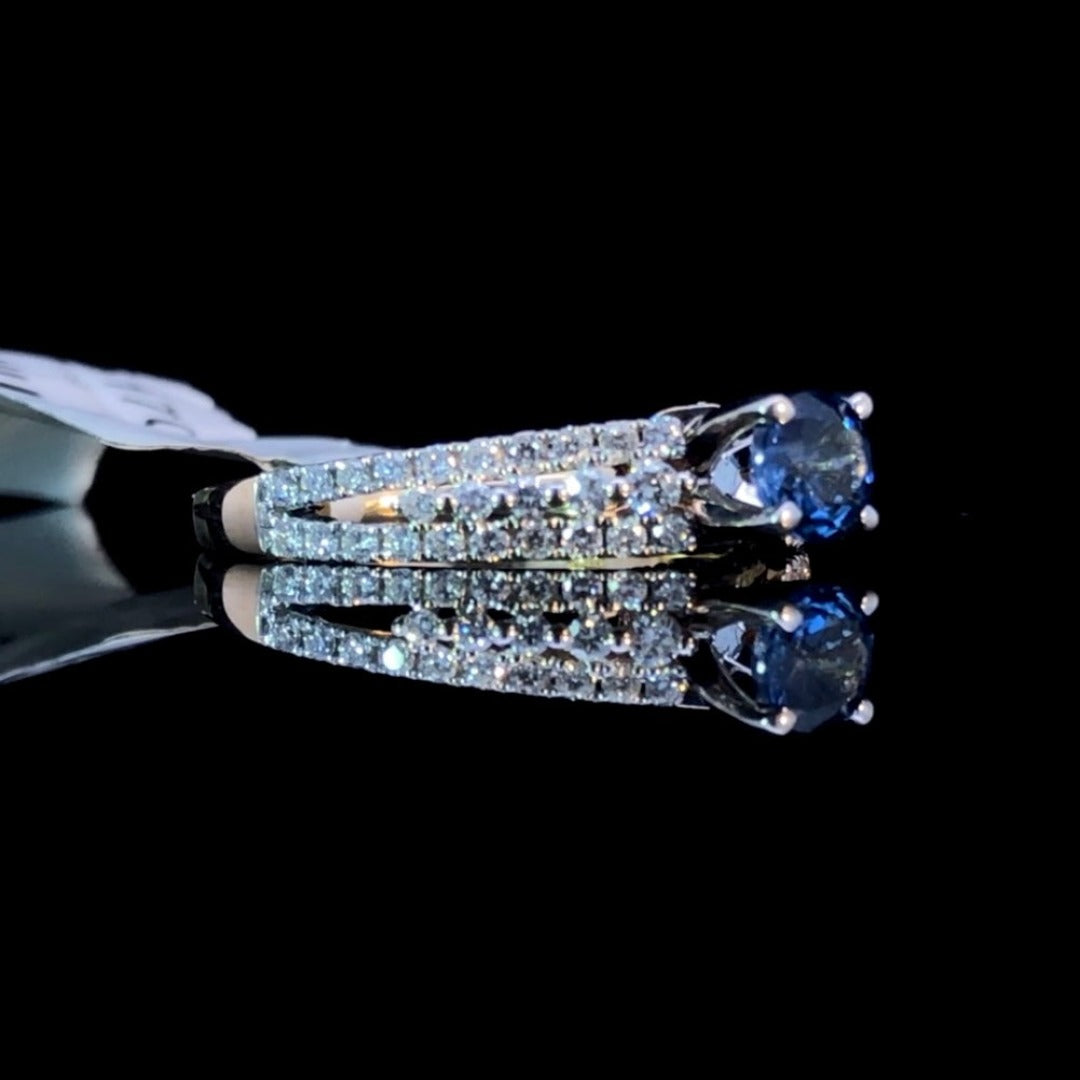 151701 - 1.30 ctw sapphire and diamond ring