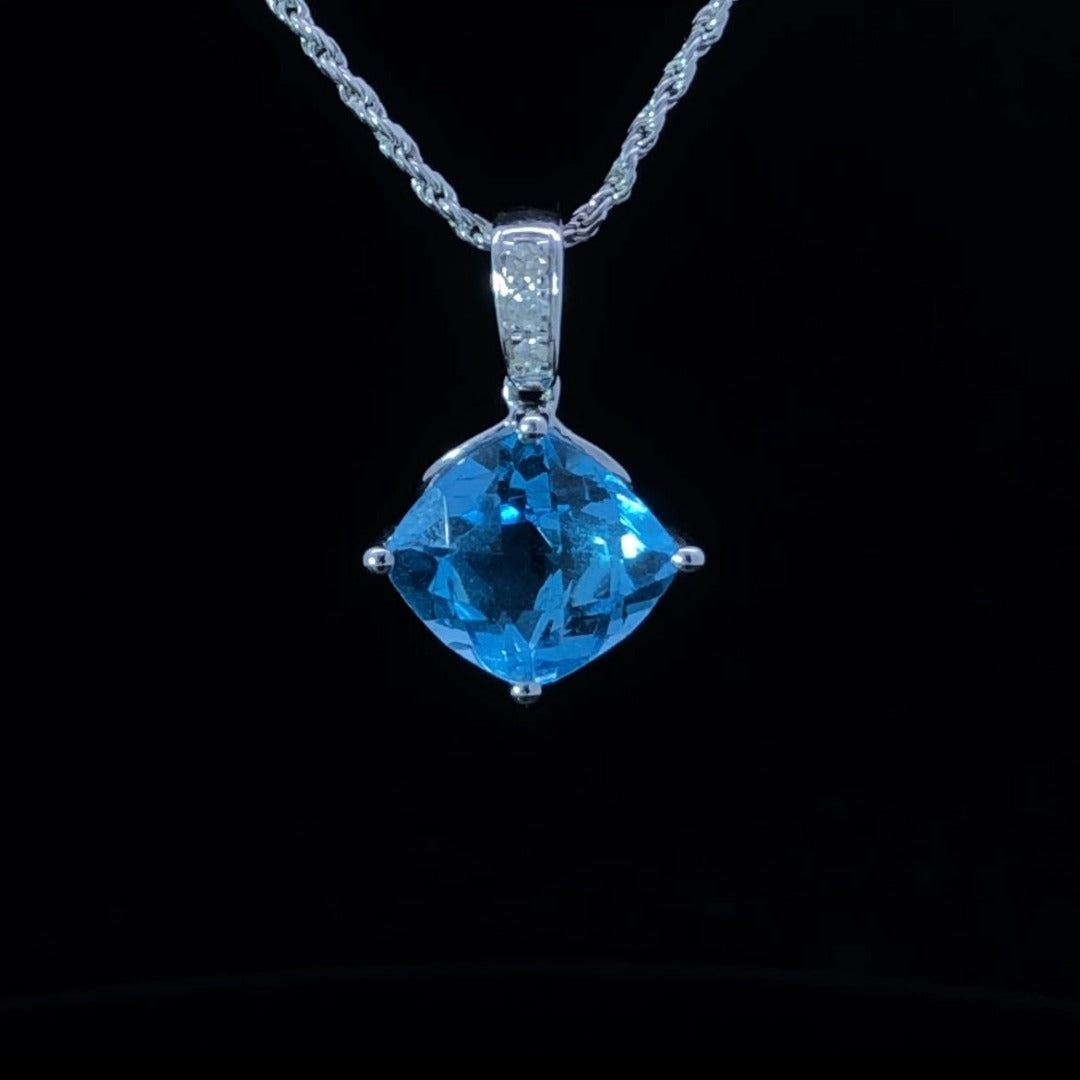 144235 - Blue topaz and diamond pendant