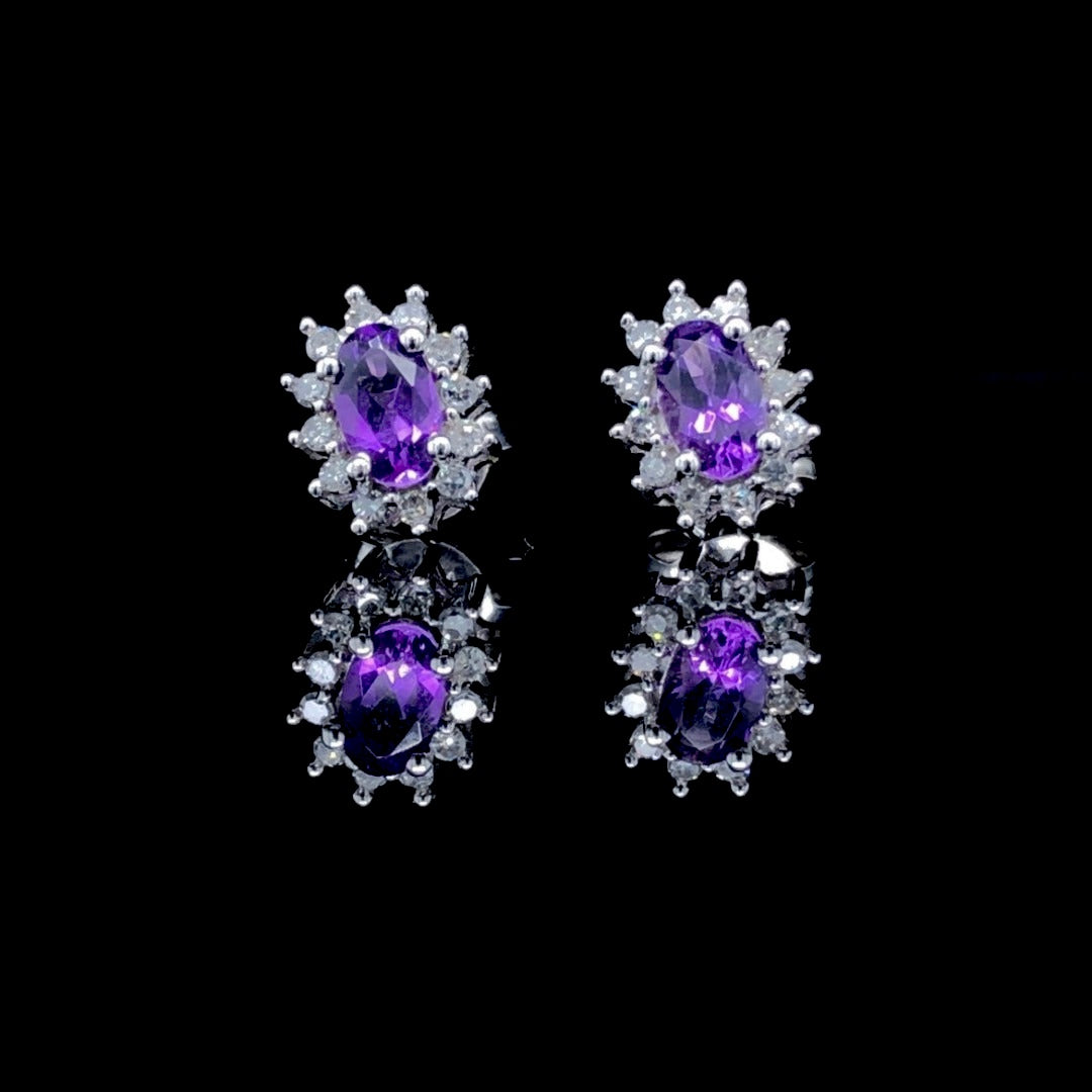 143749 - .66 ctw amethyst and diamond earrings