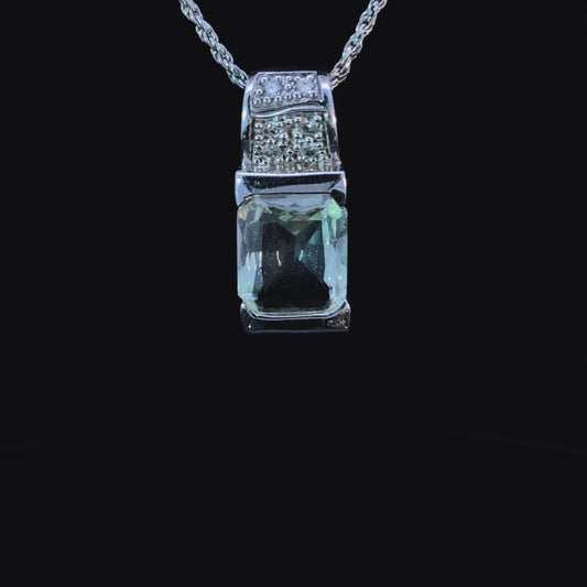Amethyst and diamond pendant