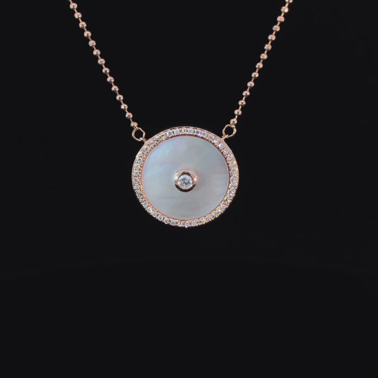 160389 - .12 ctw diamond and mother of pearl pendant