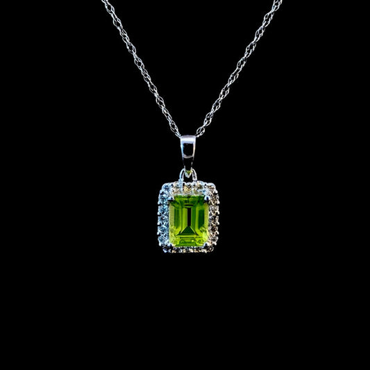 165966 - 1.15ctw peridot and diamond pendant