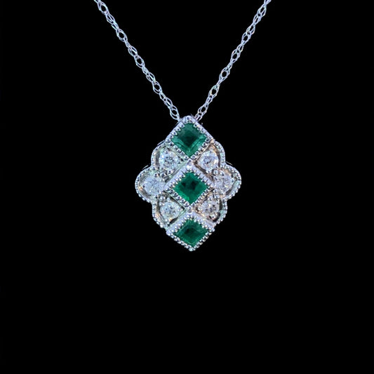 .80 ctw diamond and emerald pendant