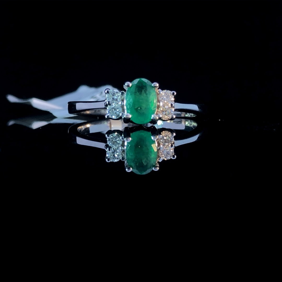 148779 - .72 ctw emerald and diamond ring