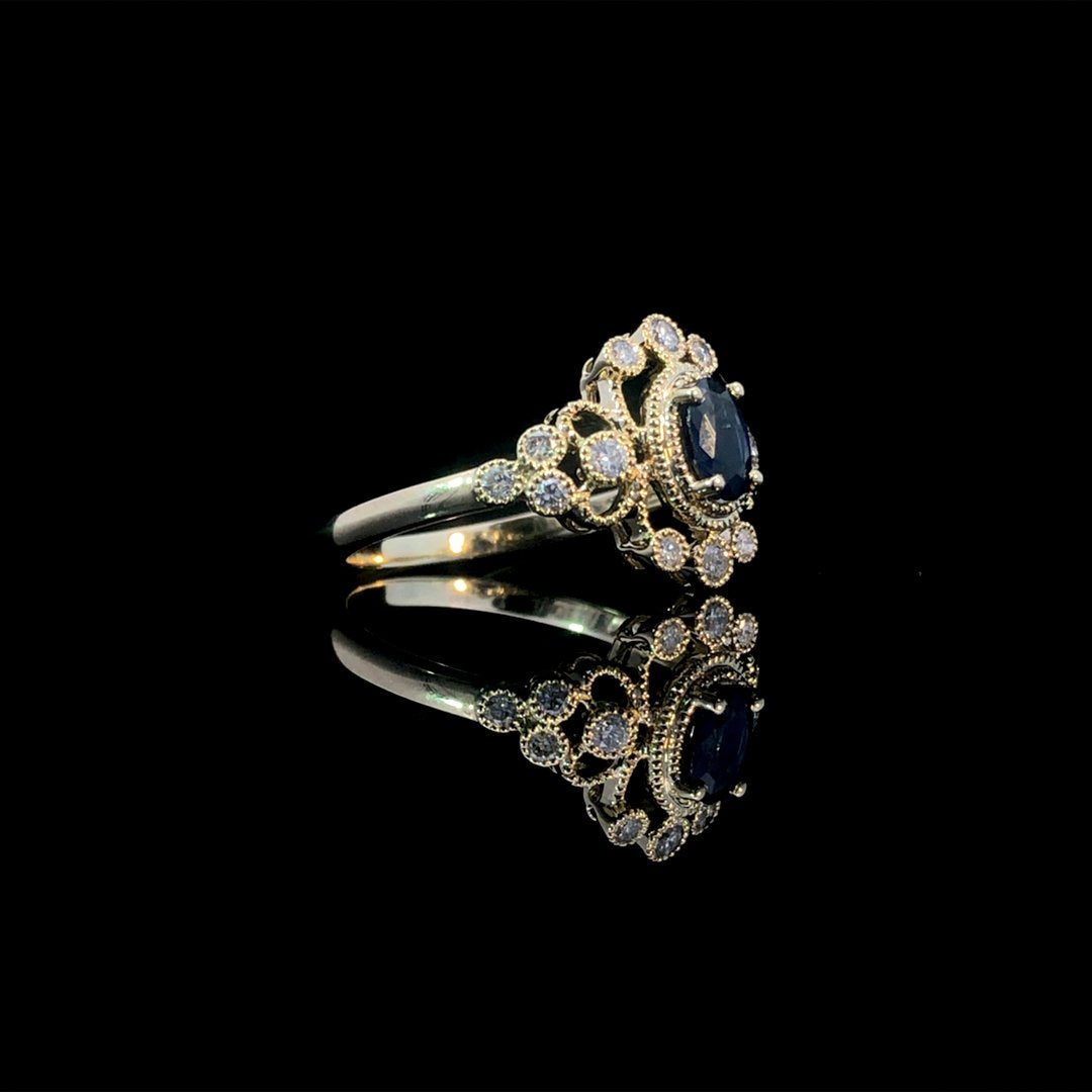 164145 - .65 ctw sapphire and diamond ring