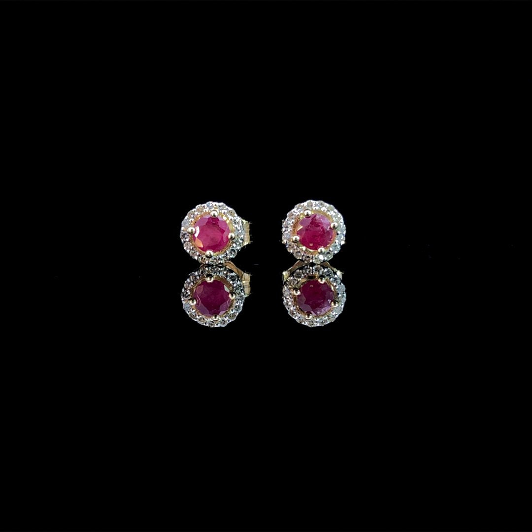 164017 - .10 ctw diamond and ruby earrings