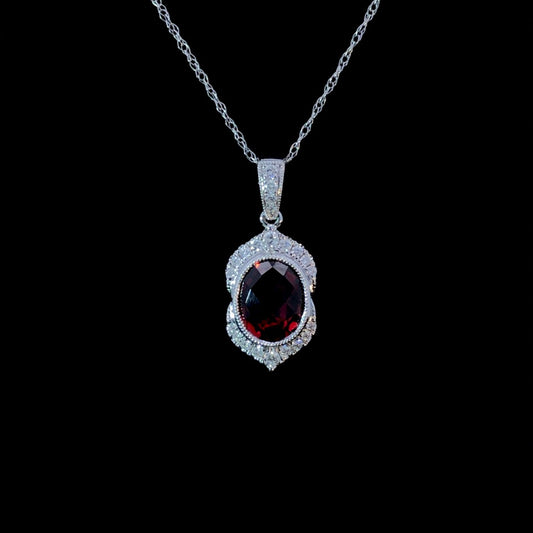 163377 - 2.23 ctw garnet and diamond pendant