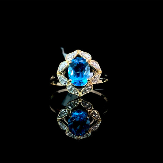 166137 - blue topaz and diamond ring