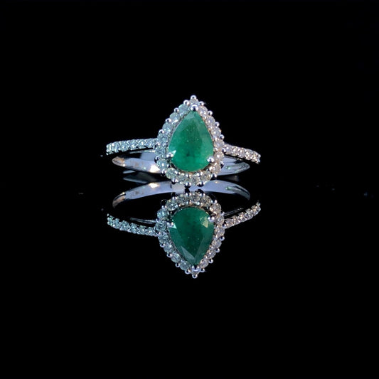 159926 - .80 ctw diamond and emerald ring