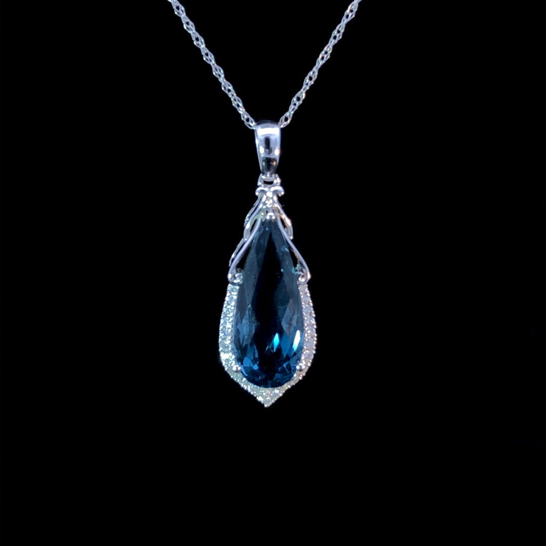 4.91 ctw blue topaz and diamond pendant