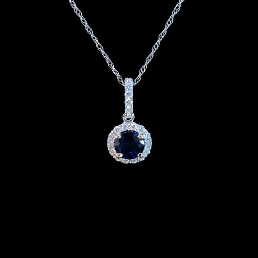 163204 - .87 ctw sapphire and diamond pendant