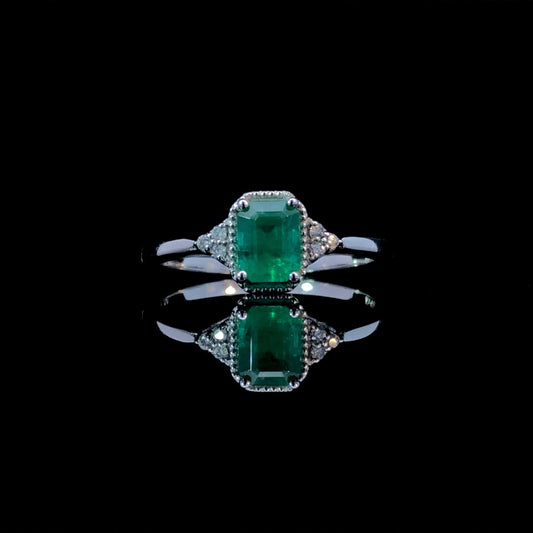 163447 - .71 ctw emerald and diamond ring