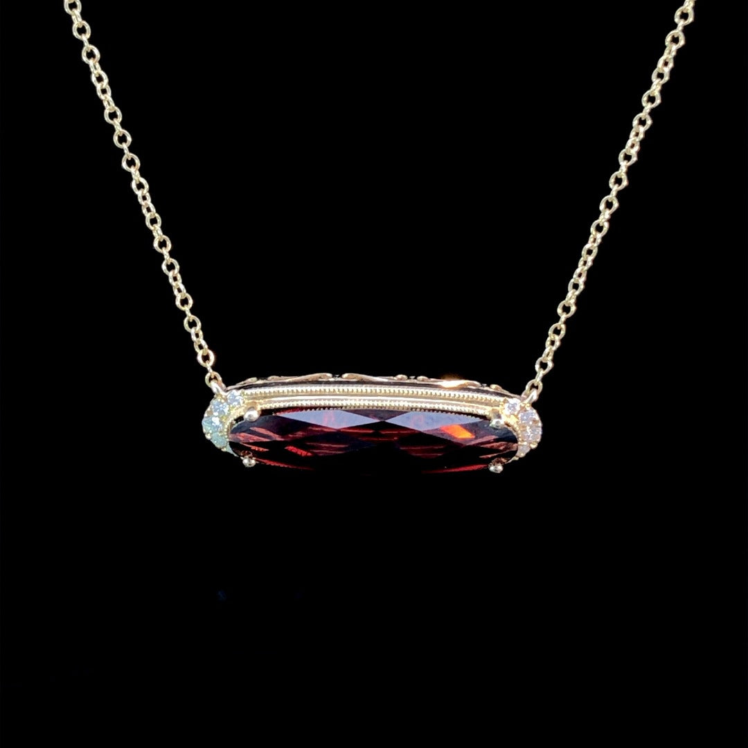 3.76 ctw garnet and diamond pendant