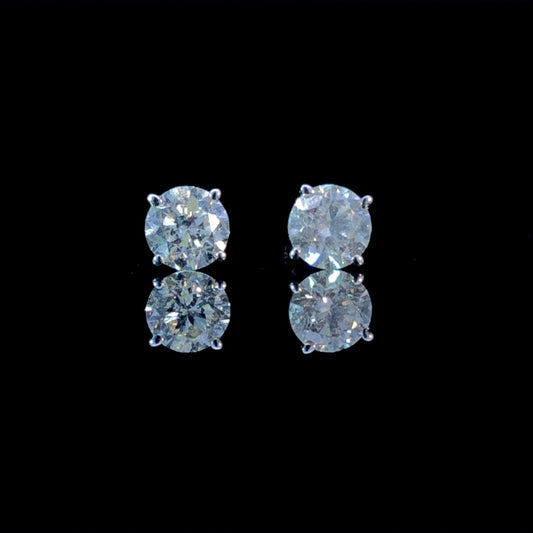 162190 - .70 ctw diamond studs