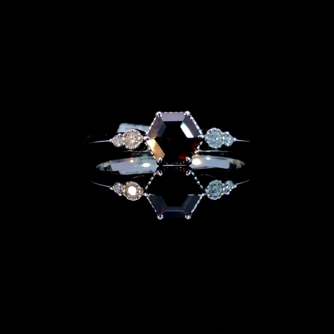 163351 - .70 ctw garnet and diamond ring