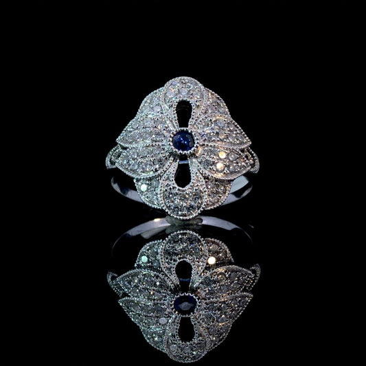 159975 - .63 ctw sapphire and diamond ring