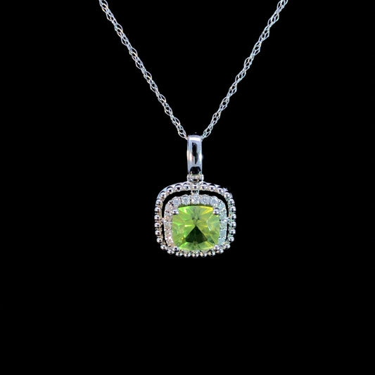 1.24 ctw diamond and peridot pendant