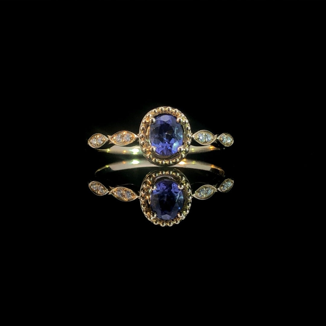 163238 - .46 ctw tanzanite and diamond ring