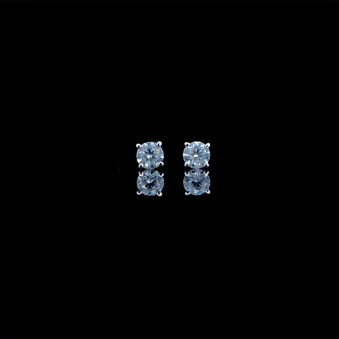 164183 - .65 ctw diamond studs