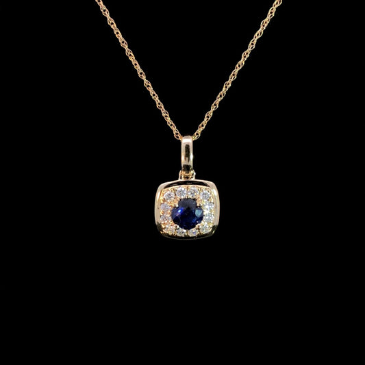 163200 - .50 ctw sapphire and diamond pendant