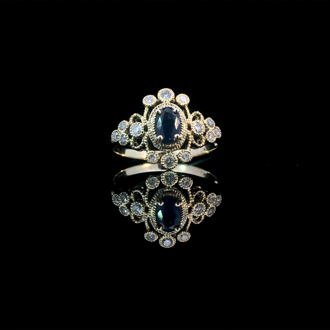 164145 - .65 ctw sapphire and diamond ring