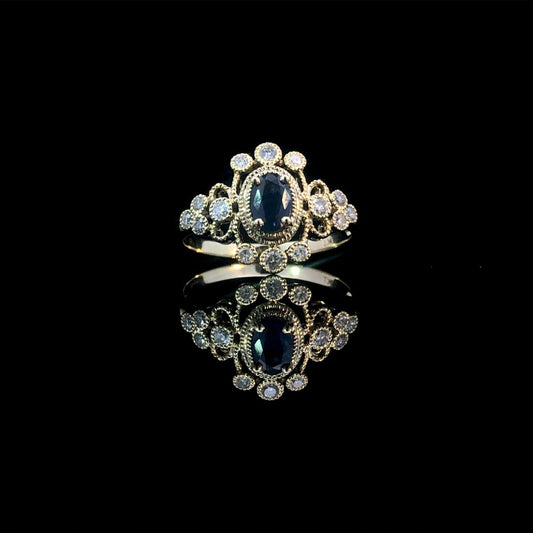 164145 - .65 ctw sapphire and diamond ring