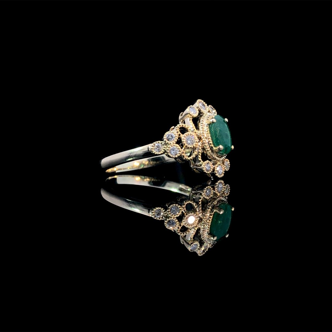 164143 - .65 ctw emerald and diamond ring