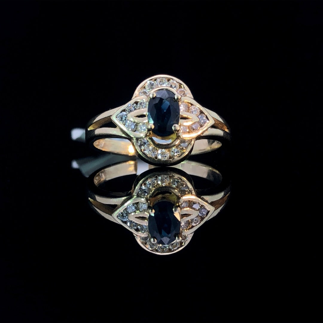 151214 - .65 ctw sapphire and diamond ring