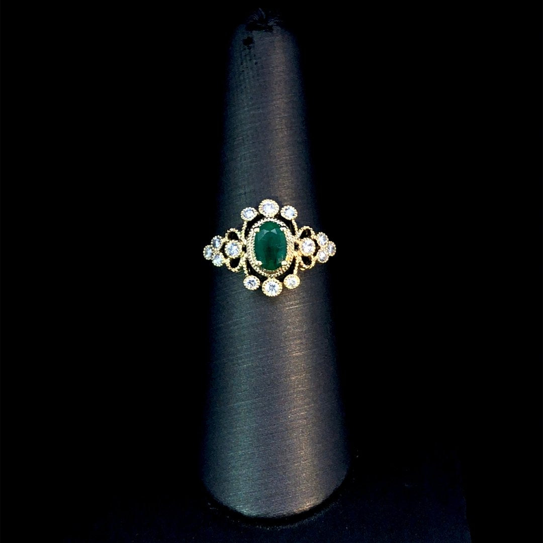 164143 - .65 ctw emerald and diamond ring