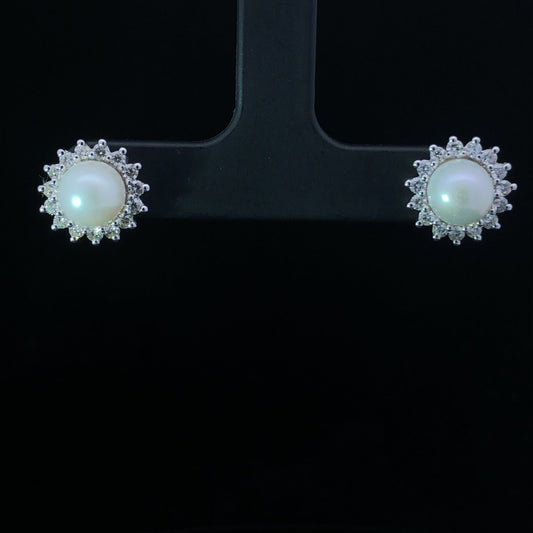 .50 ctw diamond and pearl earrings