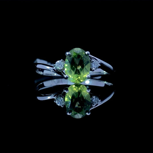 159944 - .65 ctw peridot and diamond ring