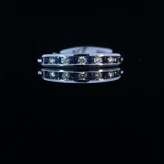 157357 - .20 ctw diamond and sapphire band