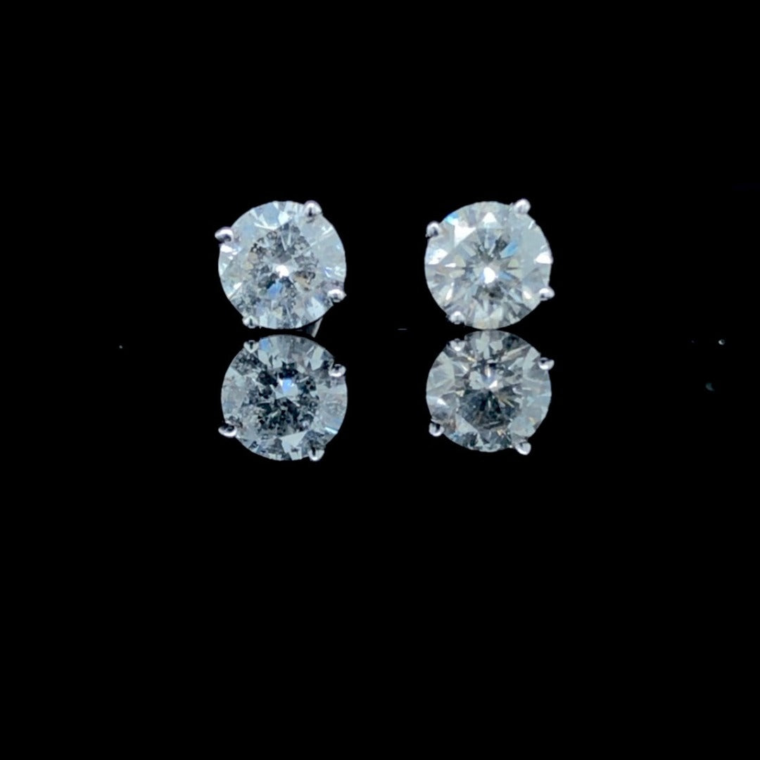 .73 ctw diamond studs