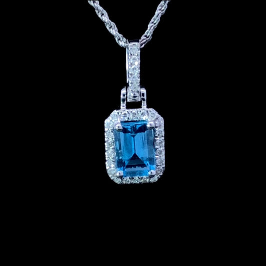 158757 - .12 ctw diamond and blue topaz pendant