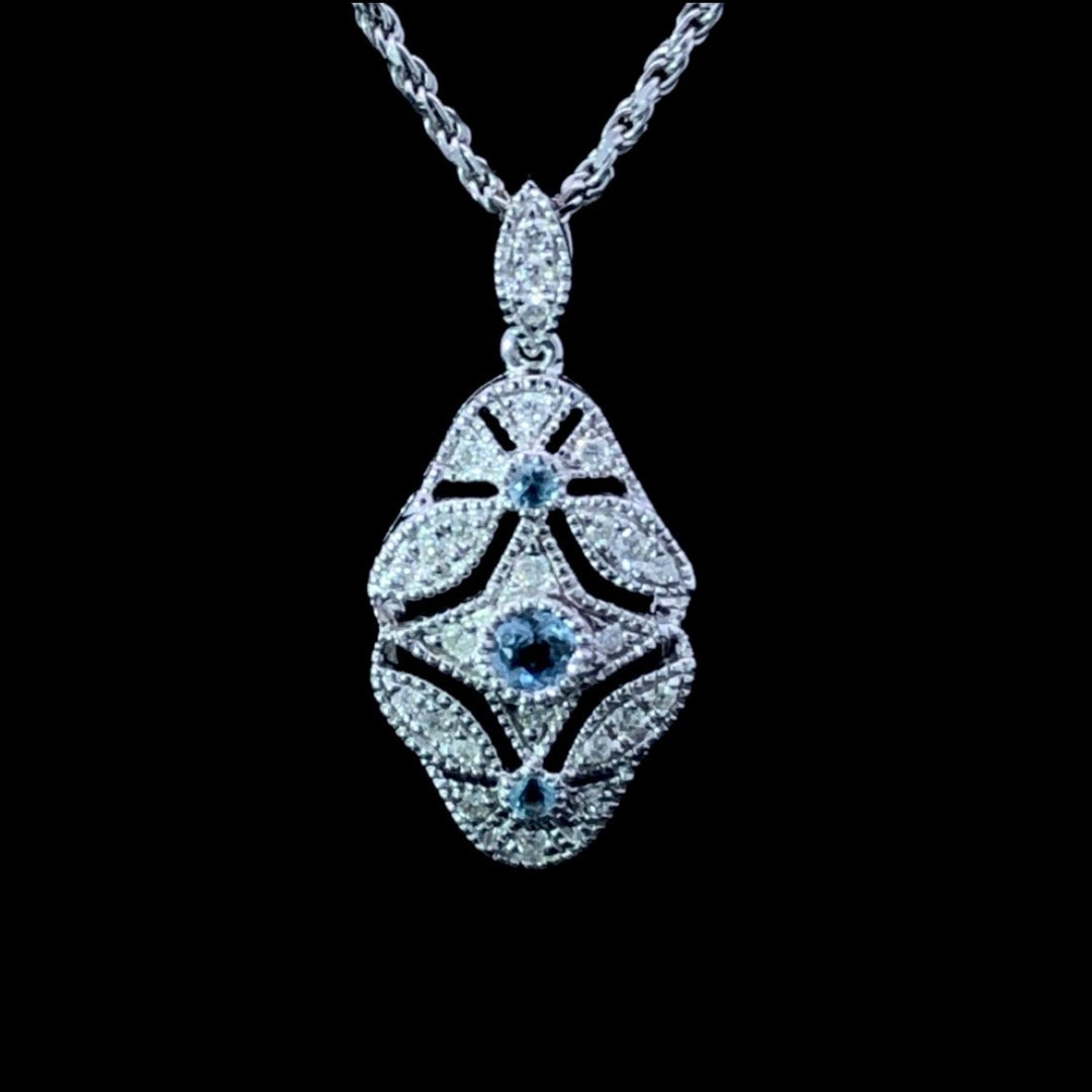 .32 ctw diamond and aquamarine pendant