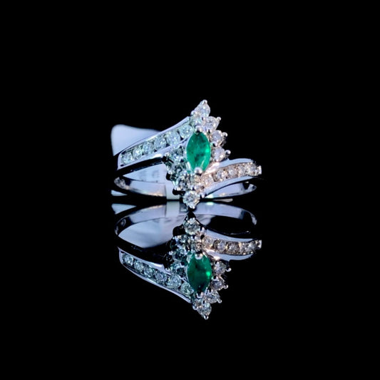 128791 - .54 ctw emerald and diamond ring