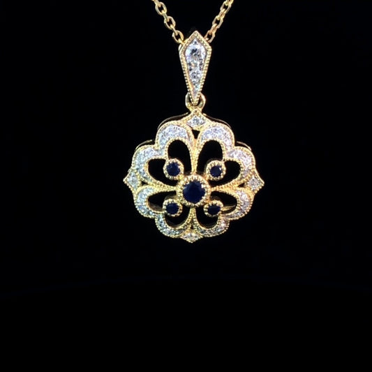 .36 ctw diamond and sapphire pendant