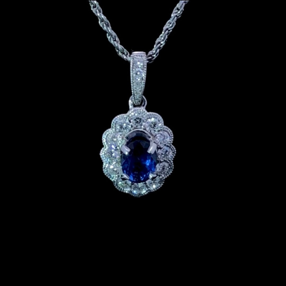 .82 ctw diamond and sapphire pendant