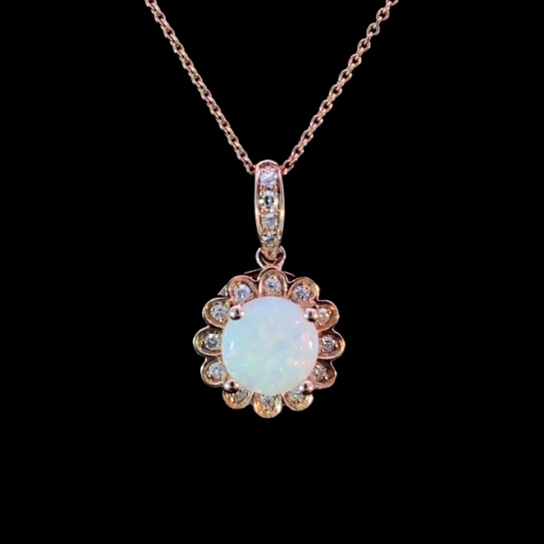 .81 ctw diamond and opal pendant