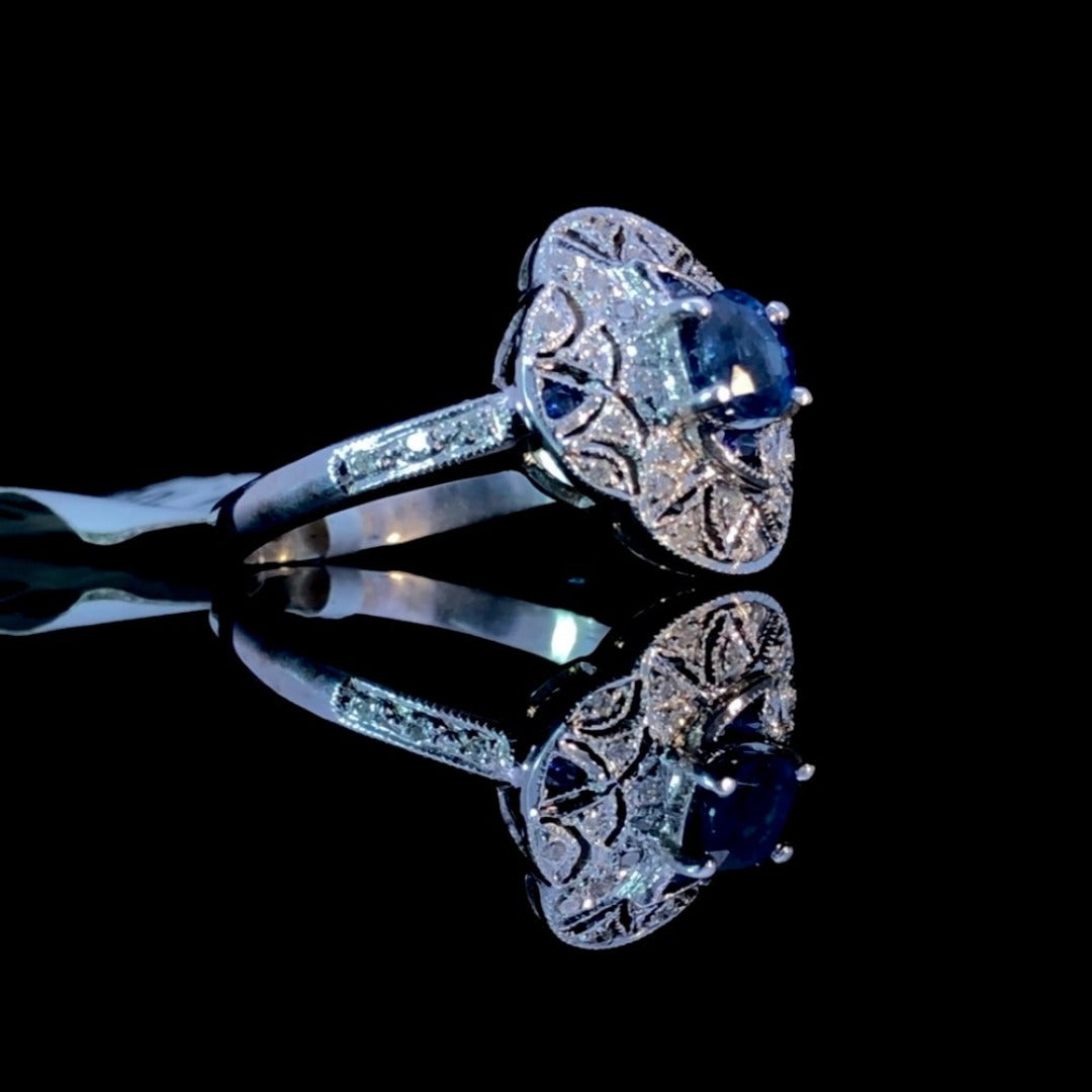 137755 - .72 ctw Sapphire and Diamond Ring