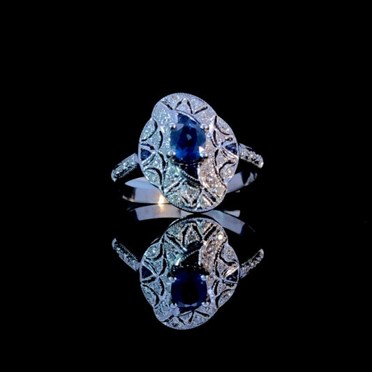 137755 - .72 ctw Sapphire and Diamond Ring