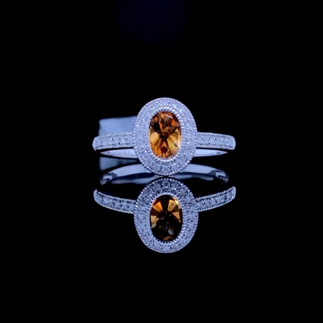 150870 - .87 ctw diamond and citrine ring