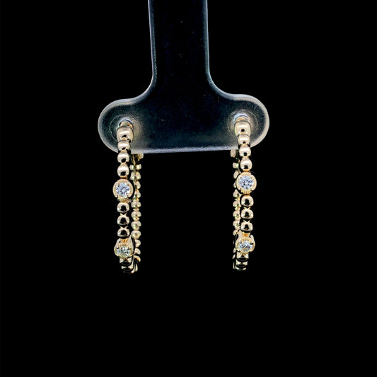 165852 - .12ctw diamond earrings