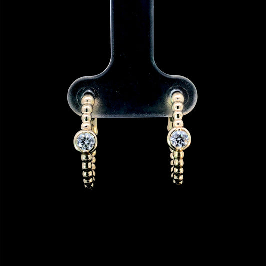 165857 - .26ctw diamond earrings
