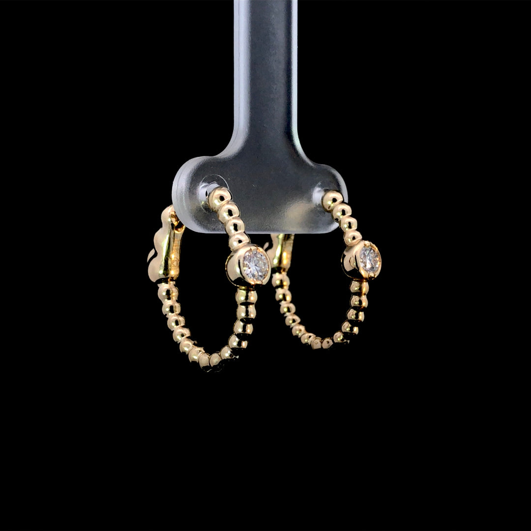 165857 - .26ctw diamond earrings