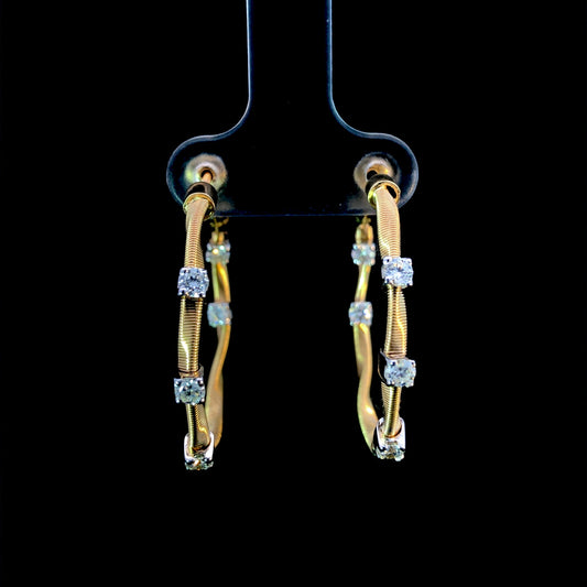 165855 - .65ctw diamond gold earrings