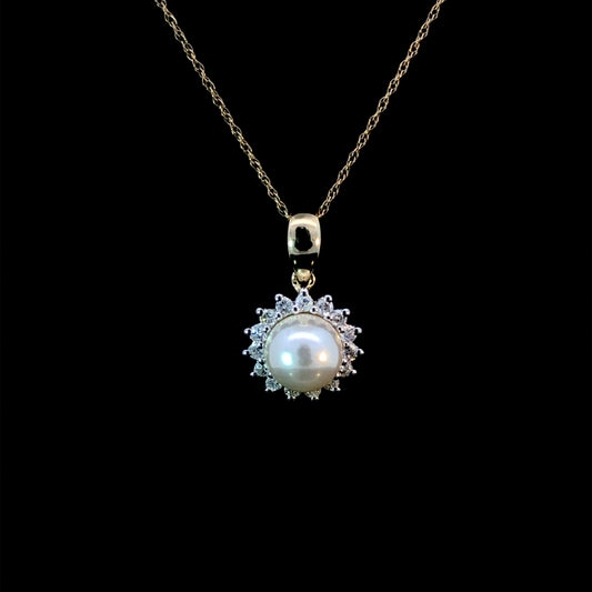 165969 - .25ctw pearl and diamond pendant